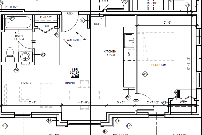 Kitchen along one side of a nice open living space. One closet in living room, and one in bedroom. Windows in kitchen, living, and bedroom.